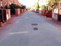 Calle residencial en Madrid con accesso a viviendas y portales